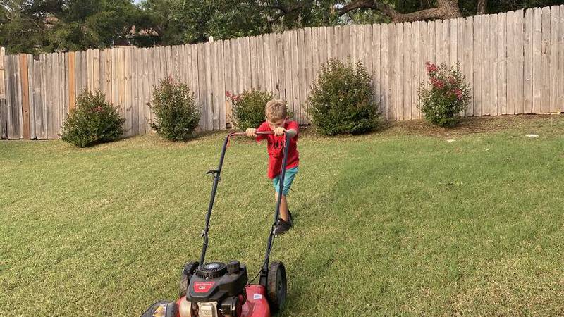 A Lawton boy is celebrating after mowing 50 yards for free.