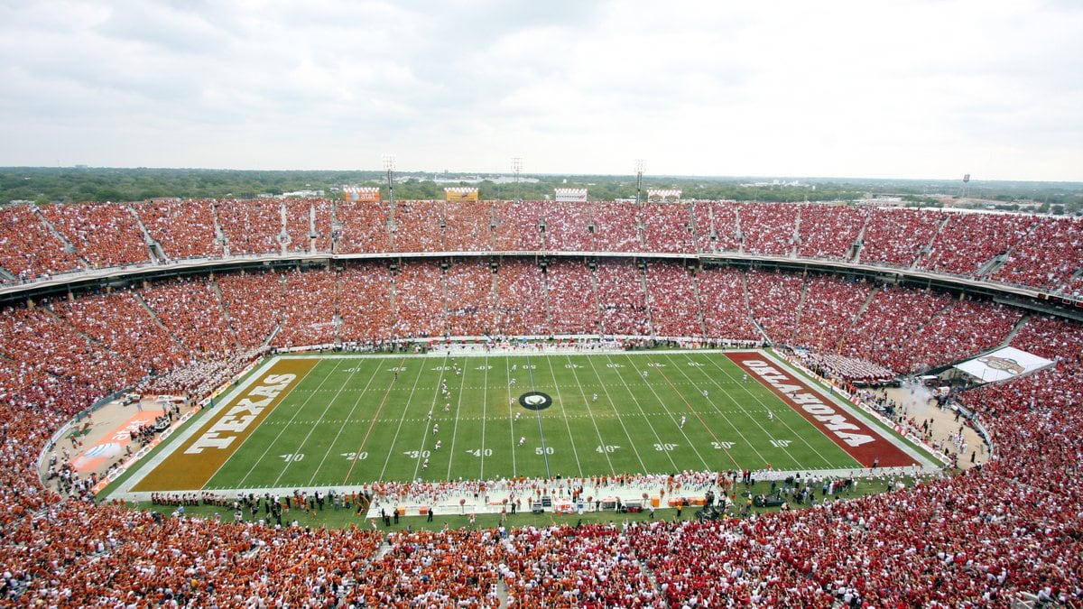 Fans cheer during the opening kickoff of the annual Red River Rivalry between Oklahoma and...