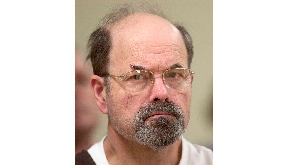 FILE - Convicted BTK killer Dennis Rader listens during a court proceeding, Oct. 12, 2005, in...